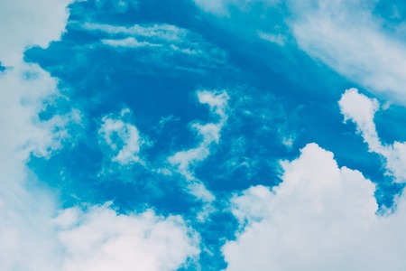 Beautiful blue sky with clouds background.の写真素材