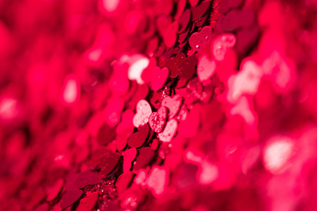 Red hearts glittering confetti texture. Happy Valentines day background.の写真素材