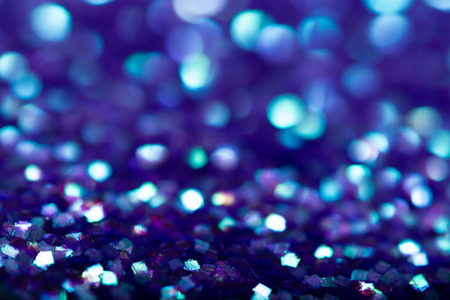 Blue glitter texture. Festive sparkling sequins background closeup.の写真素材