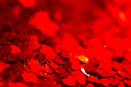 Red hearts confetti texture. Happy Valentines day background.