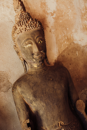 Statue of buddha in Laos old temple Wat Sisaket.の写真素材