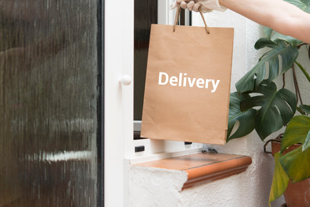 home delivering some groceries at quarantine time because of coronavirus infection COVID-19の写真素材