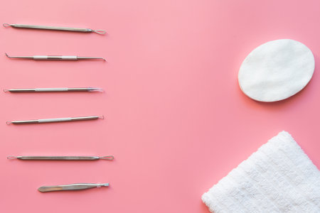 Tools of the cosmetologist for problem skin on pink paper background.の写真素材
