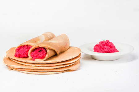 Blinis (crepes with red caviar typical of the Russian carnival)