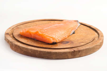 Fresh raw salmon fish white backgroundの写真素材