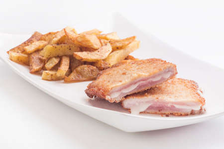 tenderloin booklets stuffed with ham and cheeseの写真素材
