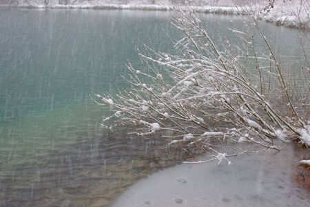Snowstorm on Plitvice lake in Croatiaの写真素材