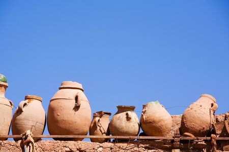 A close-up of a group of small clay potsの写真素材