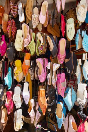 Colorful arabic shoes alignment in a shop 