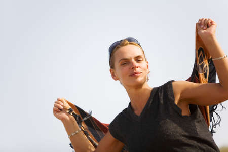 Joyful beautiful woman on the summer day
