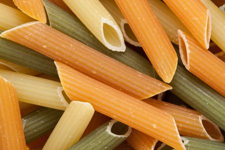 Multicolored pasta with the addition of natural tomatoes and spinachの写真素材