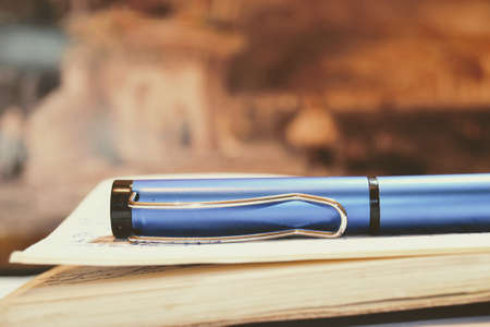 Vitange notebook and blue penの写真素材