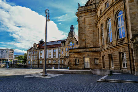 Art square of Chemnitz. Germany. 10.11.2011. Opera building near St. Peter's Church and details of...