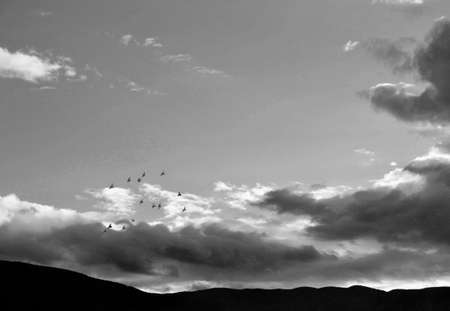 Bursa Ulu mountain and sky during overcast weather. Huge clouds stay very close to Ulu Mountain,...