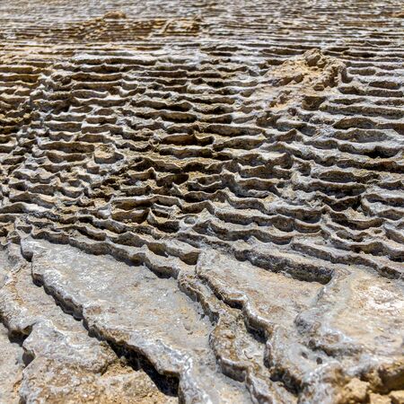 Salt cascade in the desert in Iran. Salt rock. Cascades. Salt desert