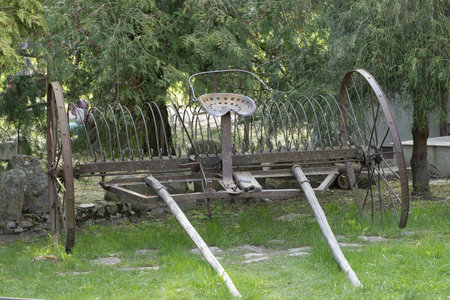 Abandoned farm equipment in a village in the south of Franceの写真素材