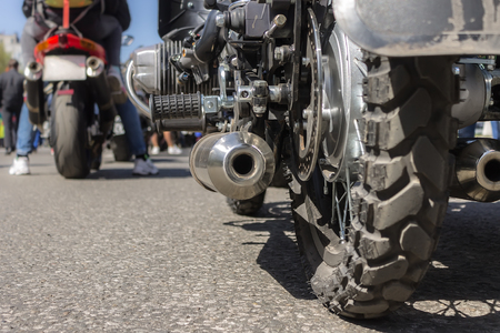 Motorcycle rear wheel and exhaust pipeの写真素材