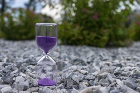 Hourglass on the rocks in a public parkの写真素材