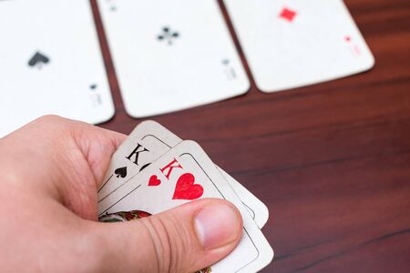 A good combination of cards in a poker game, two kings and three aces, full houseの写真素材