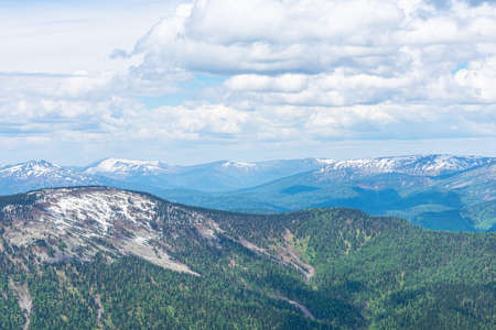 A beautiful landscape opens up a panorama of the Mountain Valley consisting of a low mountain ridge...