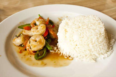 Spicy fried shrimp with riceの写真素材