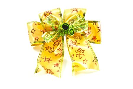 yellow bow isolated on whiteの写真素材