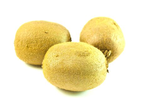 Three Kiwi fruits isolated on white backgroundの写真素材
