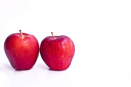 Red apple isolated on white background の写真素材