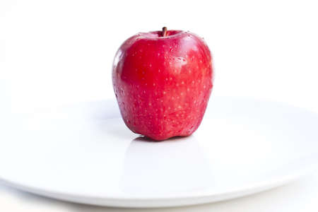 red apple isolated on white の写真素材