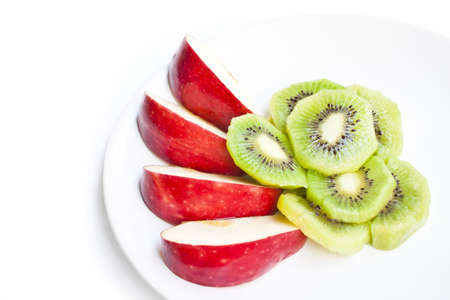 sliced Kiwi fruit and  appleの写真素材