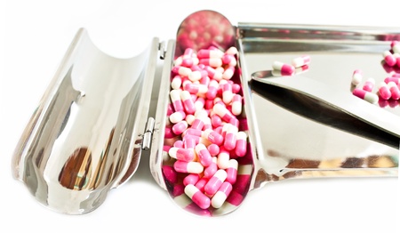 capsules on pill counting trayの写真素材