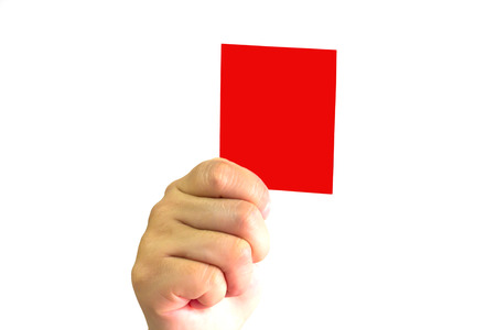 hand Of Soccer Referee Showing Red Card isolated On White Background