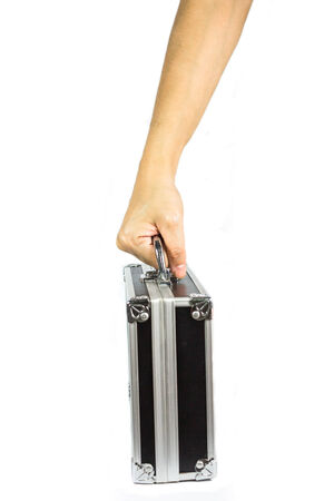 Hand and arm holding briefcase isolated on white backgroundの写真素材