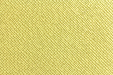 Yellow leather background or textureの写真素材