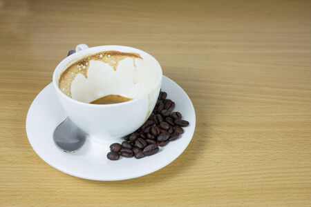 empty and dirty cup of coffeeの写真素材