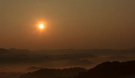 Early morning among hills in autumnの写真素材