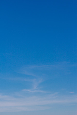 Blue sky with clouds backgroundの写真素材