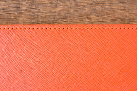 Leather and wooden background.の写真素材