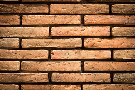 Background of old vintage brick wallの写真素材