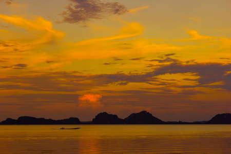 sun set with boats and sea