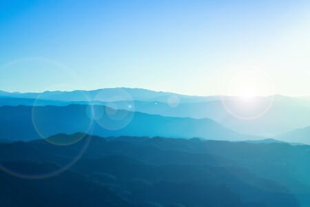 Blue mountains with sunlight in Chiangmai, Thailand. It's a winter time before sunset.の写真素材
