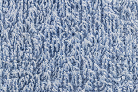 Background from closed up hairs of blue fabricの写真素材