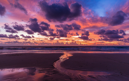 Dramatic cloudy sky in twilight covered sea and beach in Phuket, most attractive place of Thailand.の写真素材