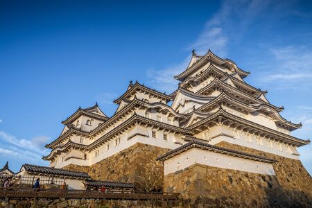 Hyogo, Japan - November 23, 2018: The ancient Himeji castle with blue sky in winter.