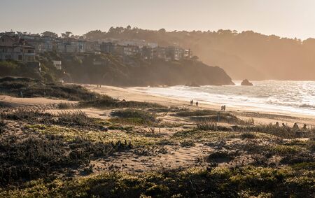Silhouetted scene of Baker beach, San Francisco, California, USA at sunset. の写真素材