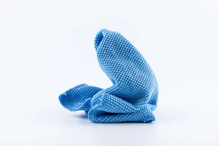 Blue microfiber fabric with rough texture for cleaning dust isolated on white background.の写真素材
