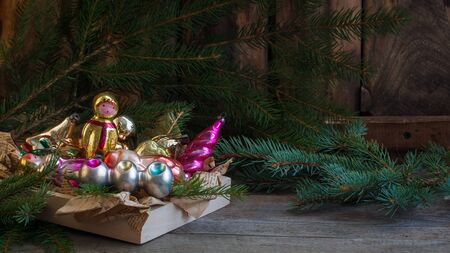 Old Soviet Russian Christmas New year glass toys on the wooden background retro vintage. Toned.の写真素材