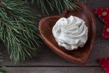 Winter feijoa tasted zephyr or marsmallows in the vintage woodenの写真素材