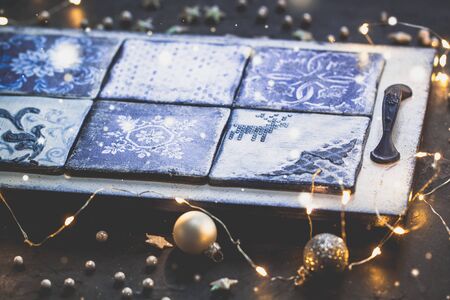 Christmas festive decorative handmade vintage white and blue tray salver. Toned.