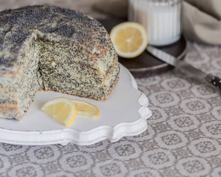 A piece of Cake with poppy seeds and lemon cream. Toned.の写真素材